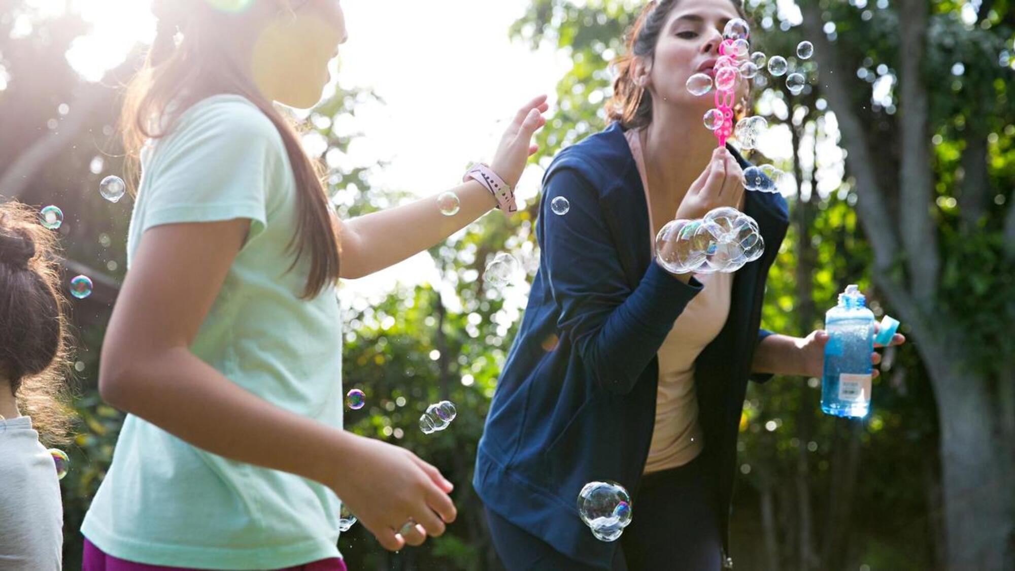 Woman blowing bubbles Nuerology